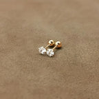 Golden four-prong twisted ball cubic Synthetic Zirconia earrings