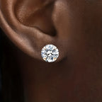 Golden four-prong twisted ball cubic Synthetic Zirconia earrings