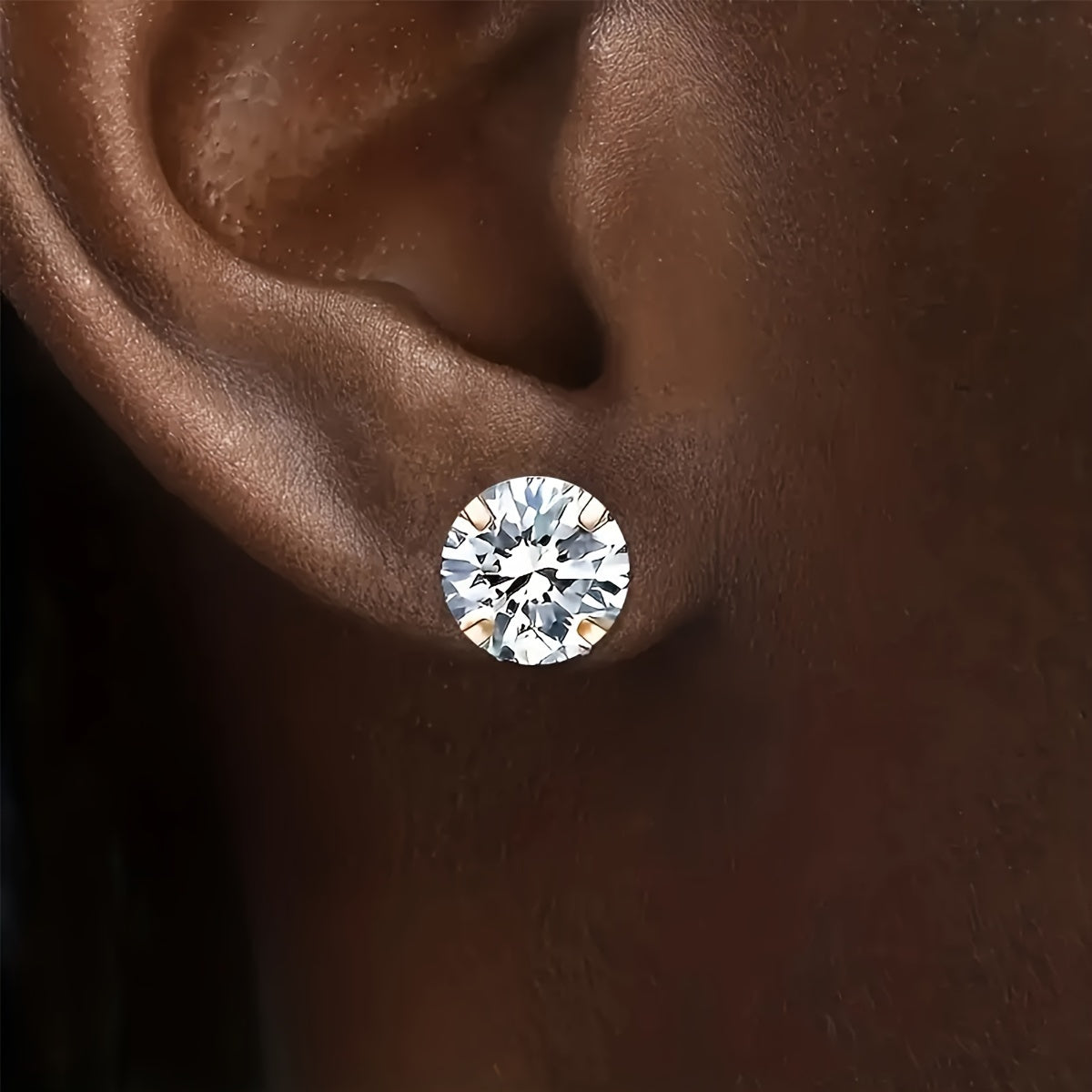 Golden four-prong twisted ball cubic Synthetic Zirconia earrings