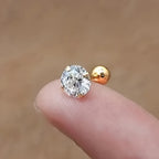 Golden four-prong twisted ball cubic Synthetic Zirconia earrings