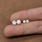 Golden four-prong twisted ball cubic Synthetic Zirconia earrings